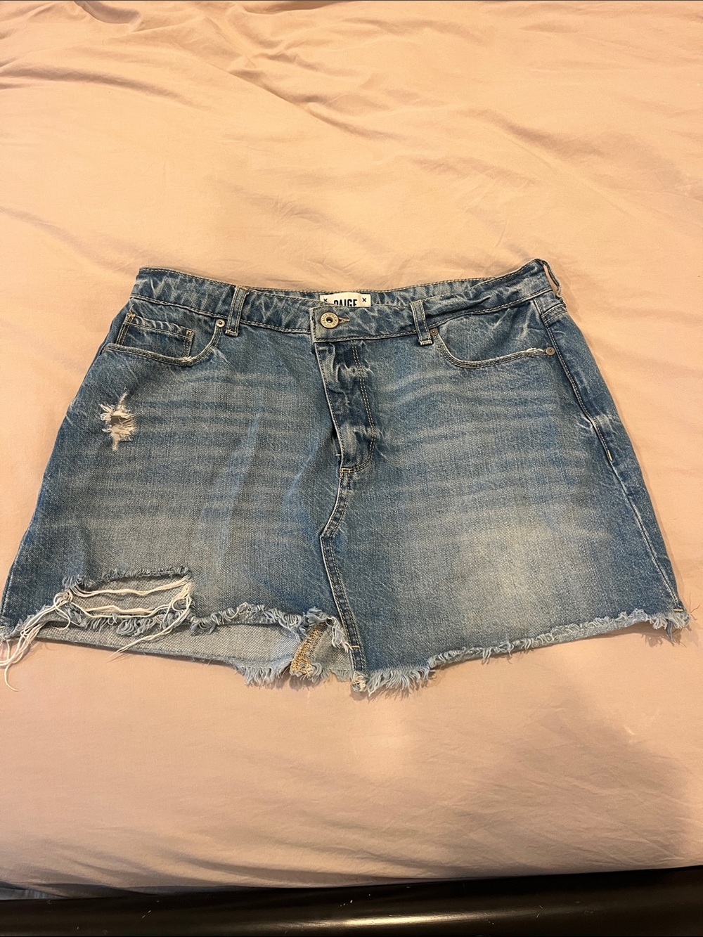 PAIGE Distressed Denim Mini Skirt in Medium Blue